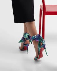 CHRISTIAN LOUBOUTIN DESIGNER HEELS, 37.5 (US 7/7.5)